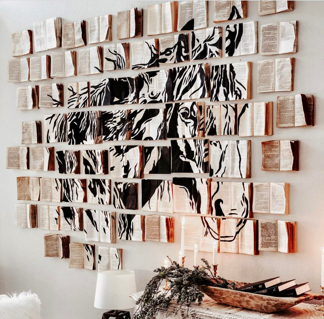 Wall art made from zebra-patterned fabric pieces arranged in a decorative pattern.